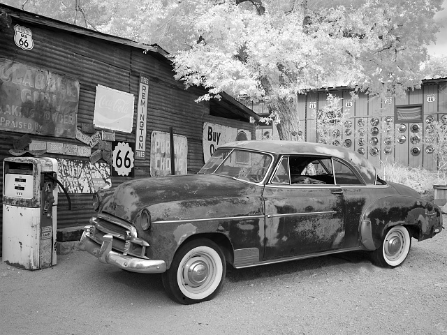 Vintage Route 66 car and gas pump